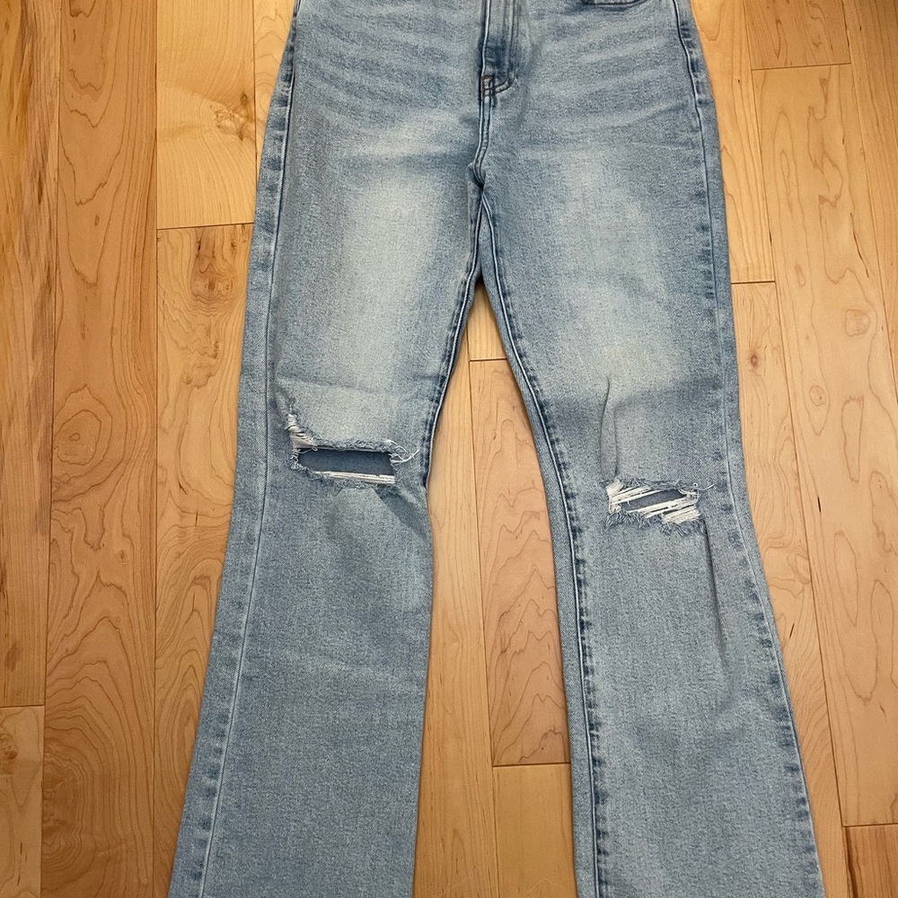 Women's Light Blue Distressed Jeans